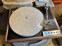 Full view of KLH Model Sixty turntable with platter and controls