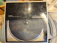 Top view of Technics SL-J2 showing scratched cracked dust cover