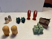 Group shot of all five shaker pairs and box