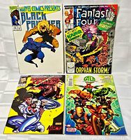 All four comic book covers laid out for full view