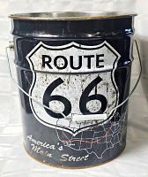 Front view of black Route 66 metal bucket showing shield graphic and map.