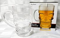 Mug beside retail box showing product image and capacity