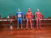 Front view of all four figures lined up