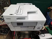 Front angled view showing overall printer body and top ADF