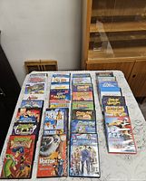 Main table view showing around 28 DVD cases laid out in rows