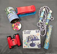 Need more images. Only first provided shows several toys but other items indicated by seller (magnetic doll set, puzzles, Go Glam nail salon) not visible yet.