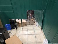 Full view of all four mirror pieces leaning against wall