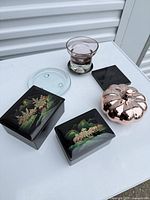 Entire lot: two lacquer boxes, glass coaster, purple votive