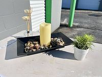 Complete set on table: tray with potpourri, LED candle, artificial plant, reed diffuser