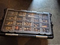 Closed Husky organizer showing clear lid and contents