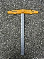 Full view of drywall scoring square showing entire tool