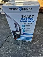 Front of sealed retail box showing product image and features