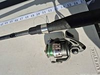 Rod handle with attached RX20 spinning reel