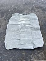 Top view of folded-out gray queen air mattress showing baffle pattern