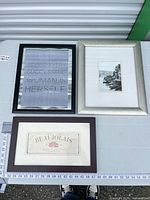 All three framed prints laid out showing fronts and approximate size with ruler