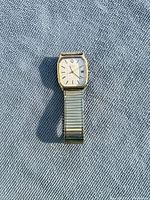 Front view of Timex watch showing dial and band