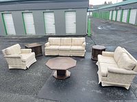 full set arranged outdoors showing all seating and tables