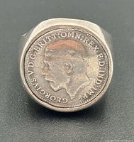 Front view of ring showing King George V obverse of 1919 threepence coin