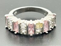 Front view of sterling silver ring showing multi-stone arrangement