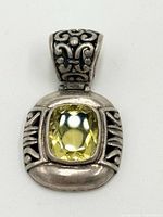 Front view showing citrine and silver scroll design