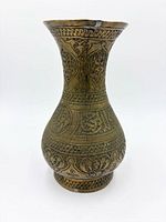 Full view of copper vase front profile showing etched patterns