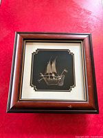 Full view of framed sterling silver ship artwork