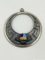 Front view showing geometric pattern and multicolour mosaic stone