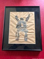 Front view of framed painting showing artwork and frame