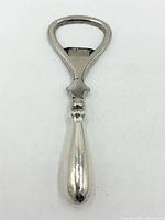 Front view of silver bottle opener