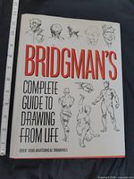 Front cover showing title, author, size reference ruler