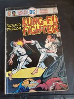 Front cover showing title, artwork, publisher logo and wear