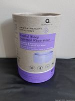 Front of Aromahome Aromatherapy Infusions tube showing product name and illustration