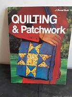 Front cover showing title Quilting & Patchwork and image of patchwork bag