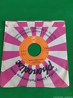 Front of record in Phonodisc sleeve showing title side centre label