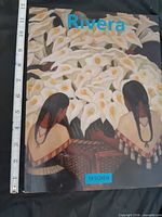 Front cover showing title Rivera and publisher Taschen with measuring tape for scale
