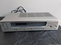 Front view of Technics SA-210 receiver showing entire unit