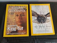 Both magazines side by side showing full front covers