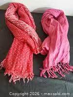 Both scarves side by side showing color and fringe