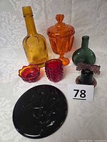 All seven colored glass pieces arranged on surface