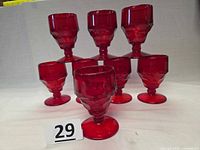 Eight ruby red Viking goblets grouped