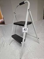 Full view of two-step ladder open