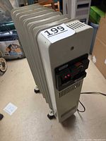 Full view of DeLonghi oil-filled radiator on wheels