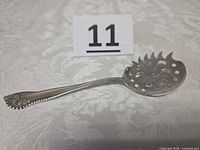 Full view of Gorham sterling slotted server