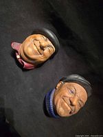 Both Bossons heads side by side on black background