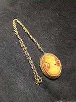 Full view cameo locket on chain