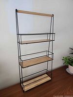 Front view showing full rack with three shelves