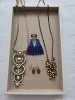 All jewellery items arranged in display tray