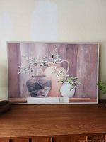 front view of framed still-life print