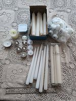 Overview of all candles, LED tea lights bag, night light, ruler for scale