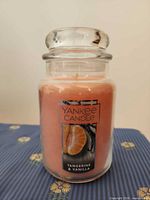 Front view of Yankee Candle jar showing label and wax color